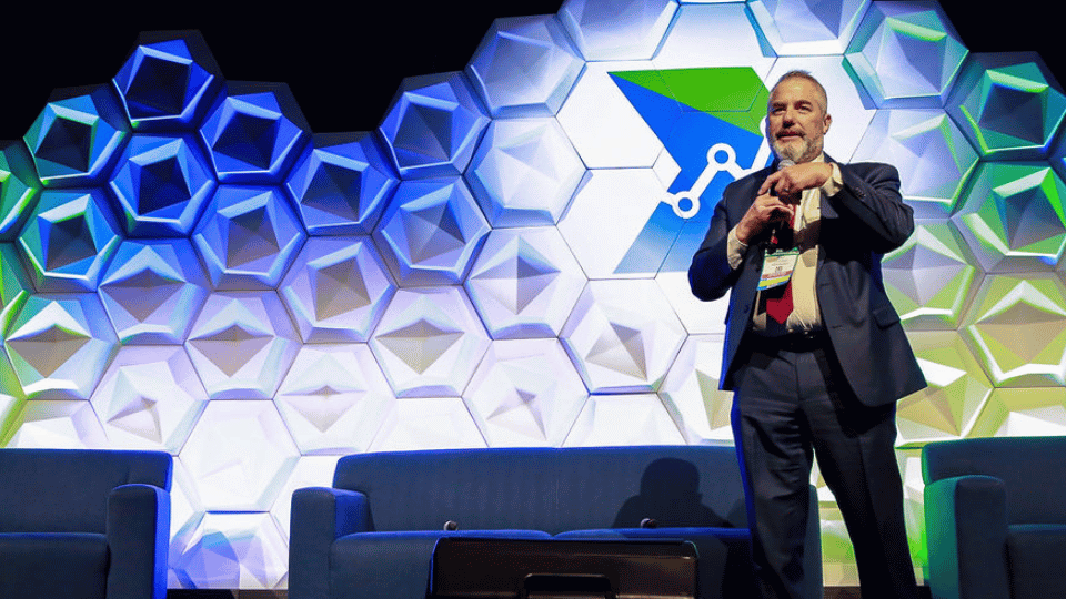 Speaker presenting at data center retrofit conference