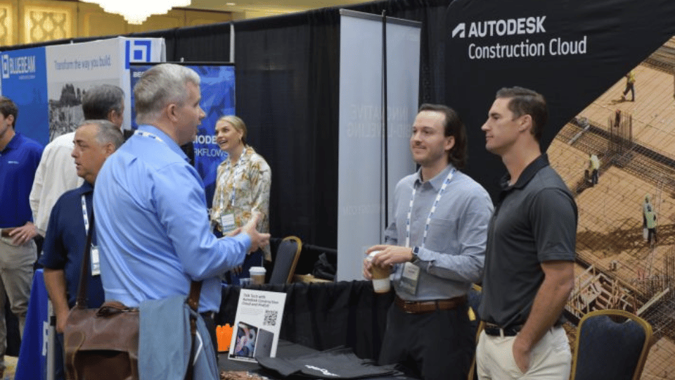 Industry professionals networking at infrastructure retrofit conference