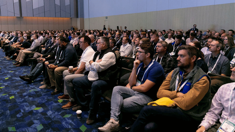 Attendees networking at data center retrofit conference event