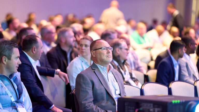 Audience attending data center retrofit conference session